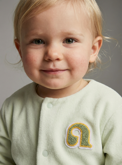 Малыш в одежде Anna Leon